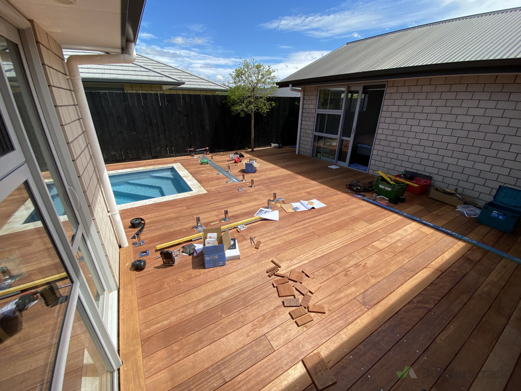 Garapa deck wrapping a pool in Papamoa