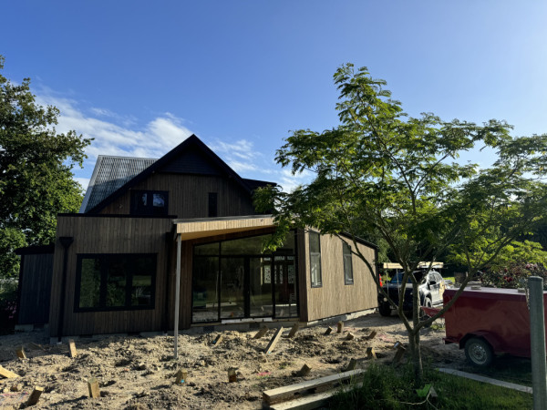 Macrocarpa cladding came up really nice! Well done to the clients colour choices on the existing cedar shingles also the soffits and window facings/trims.