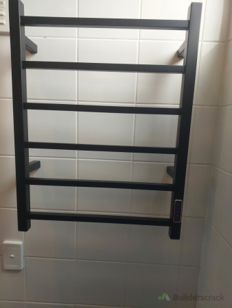 Modern look and power saving. New Heater towel rail with timer function