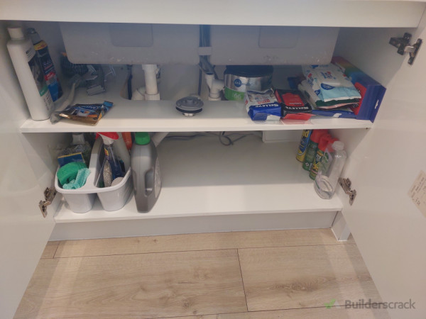 New kitchen shelf added under sink cabinet