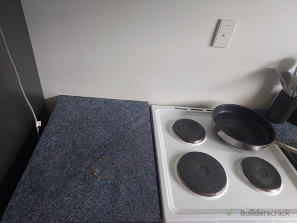 Old benchtop with burnt marks