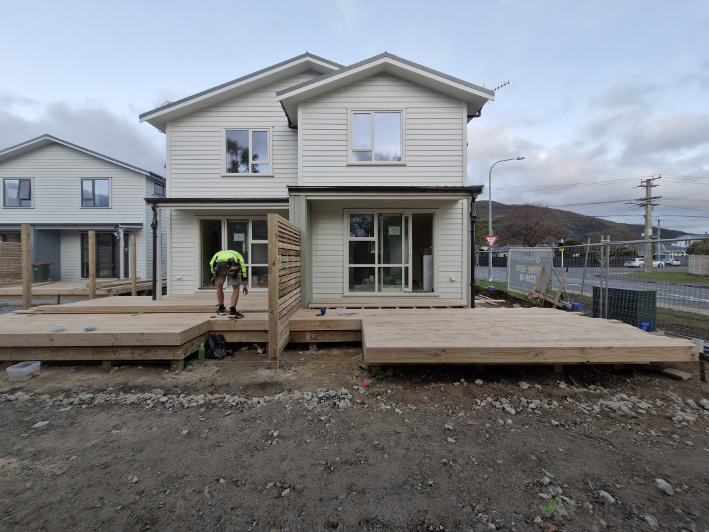 Duplex with pine decking and divider screen