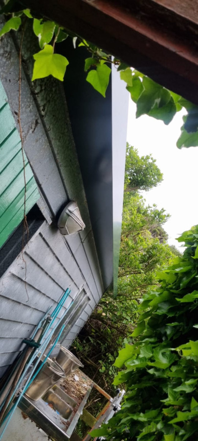 Install new metal gutter