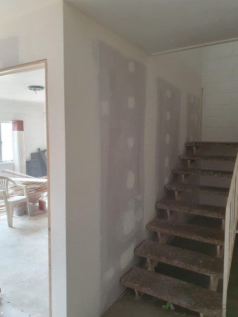 plastering stair wall