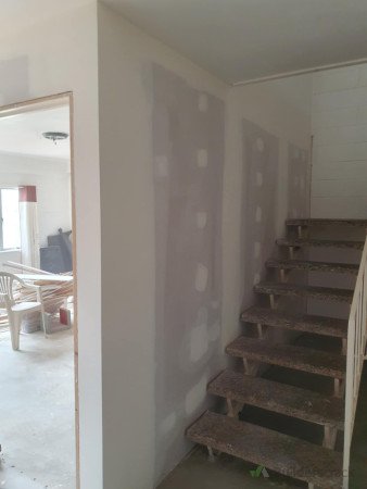 plastering stair wall