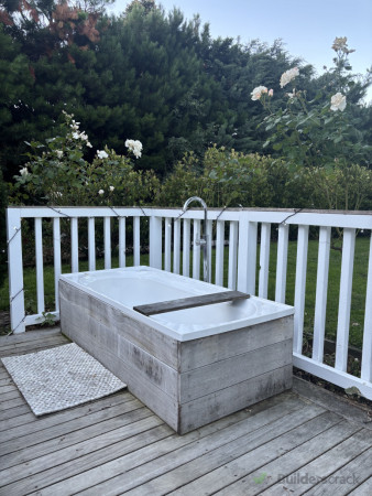 Outdoor bath plumbed into hot water cylinder
