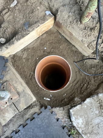 Sand defeated from caving in by PVC pipe.