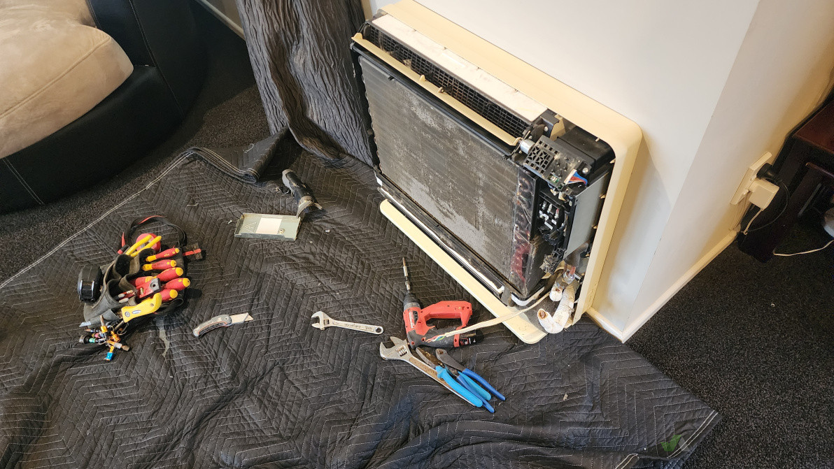 Existing heat pump being removed