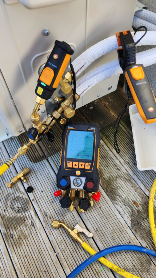 Vacuum of heat pump gas lines and testing the system.