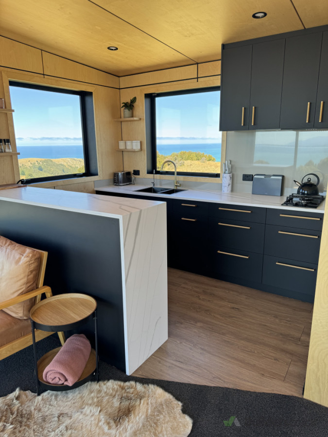 Kitchen and breakfast bar in a luxury accommodation