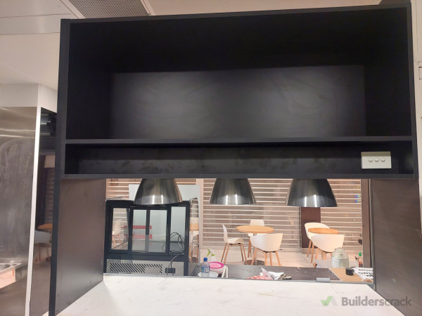 Black above counter cabinets, pendant heatlamps, electrical