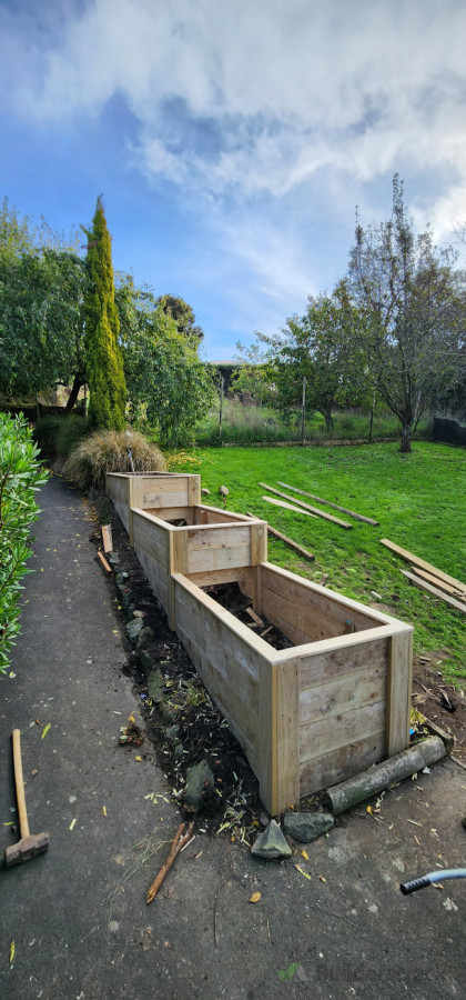 Terraced planters are perfect for sloped pathways!