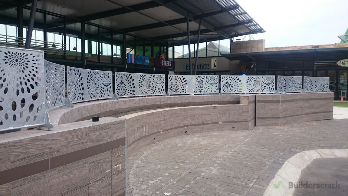 Decorative facade in front of mall entrance