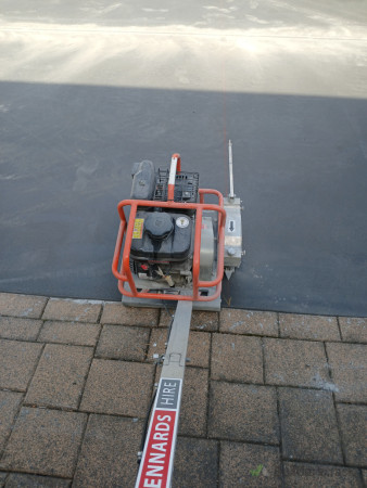 Softcut concrete saw, used early to help prevent concrete cracking
