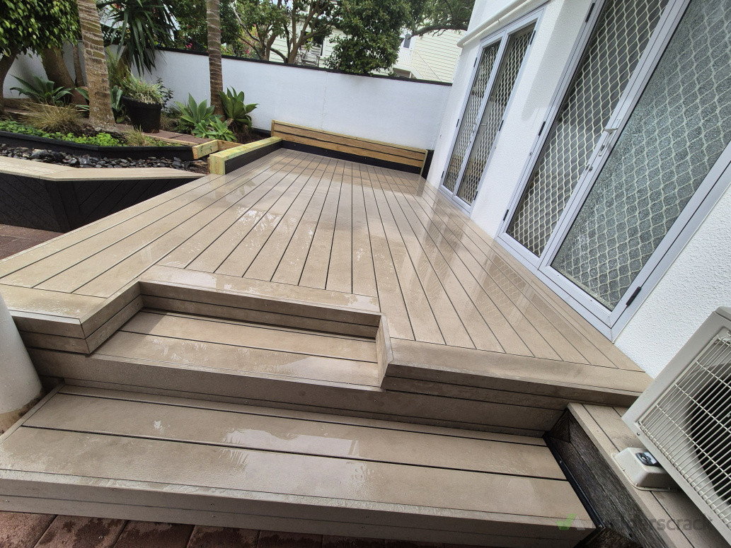 Futurewood deck with stairs and retaining walls