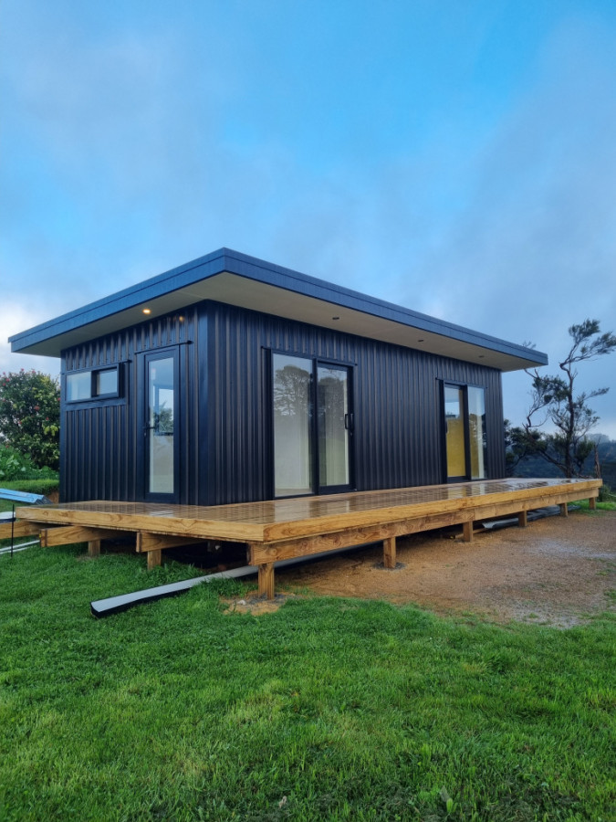 Black wall cladding  ,fascia and roof