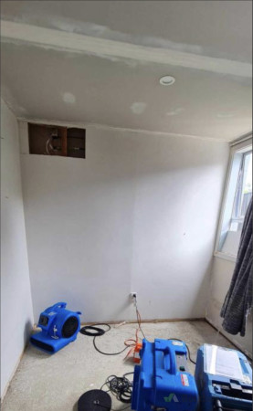 New ceiling, wall and window frame.