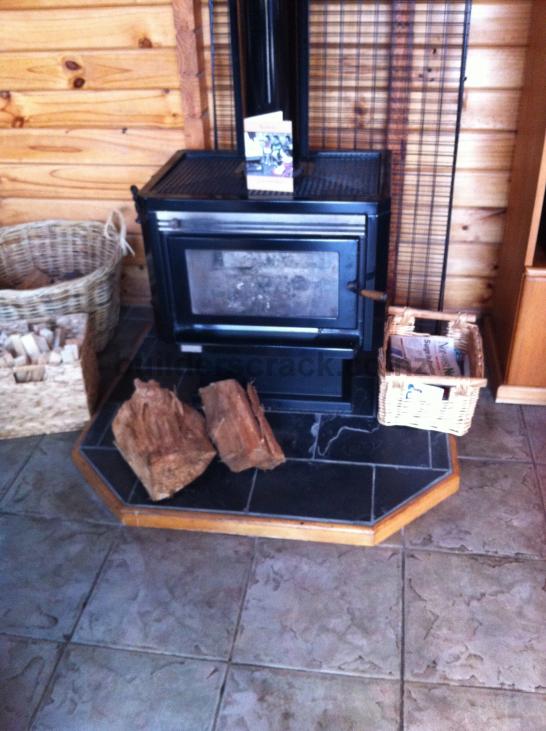 Remove a free standing Kent fireplace. ( 44655) Builderscrack