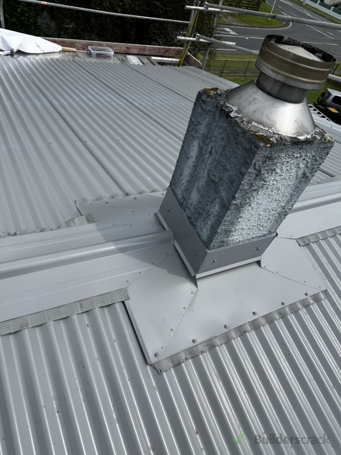 Installed new chimney flashing at the apex of roof