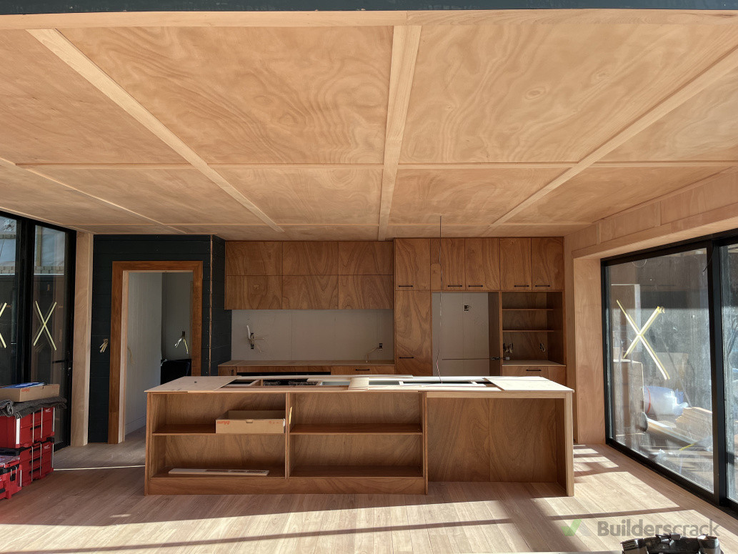 Gaboon Board & batten setout perfectly through the kitchen