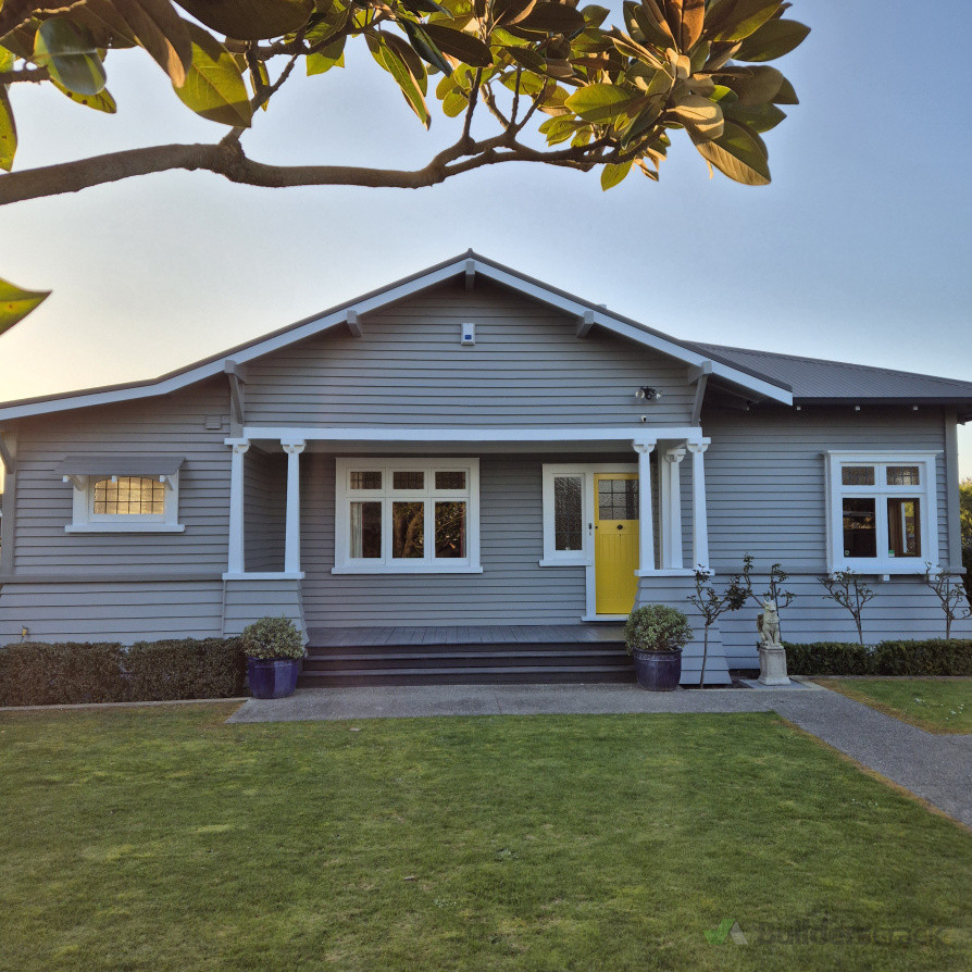 Beautiful after photo as the Sun sets, featuring the Kowhai door and Franz Joseph walls with Okarito windows and trim
