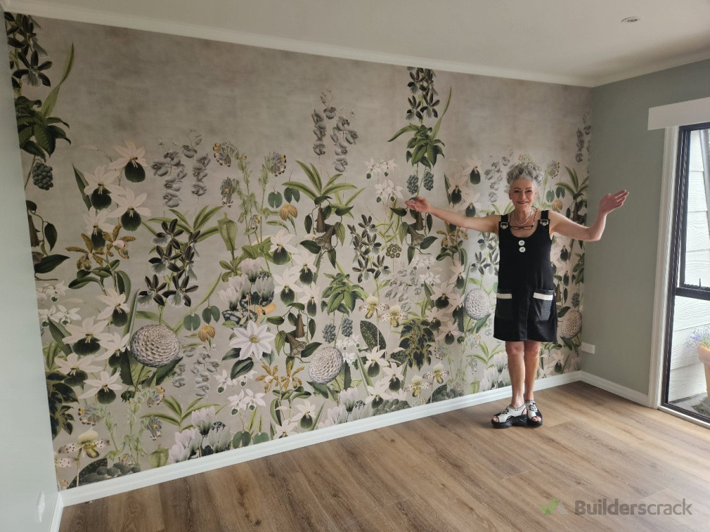 Astar young  proudly appreciating the wallpaper i hung for her, including the painting in her master bedroom