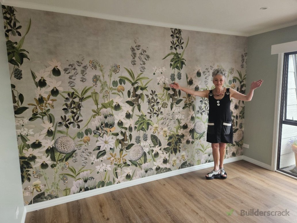 Astar young  proudly appreciating the wallpaper i hung for her, including the painting in her master bedroom