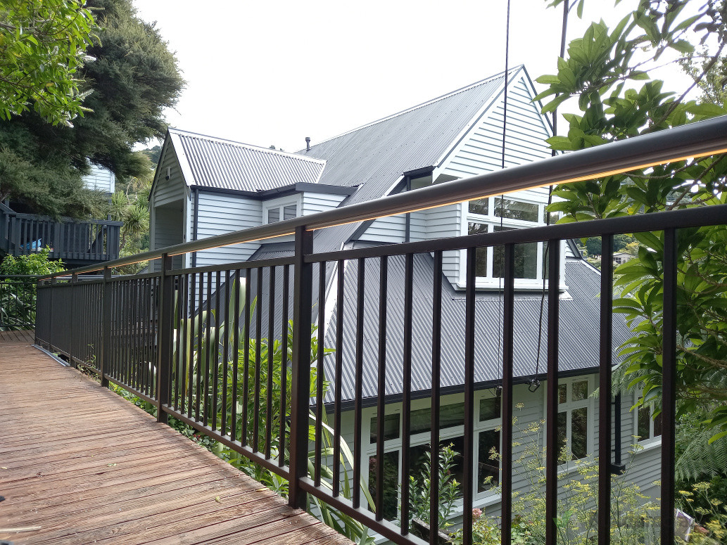 LED Strip lighting on a handrail for the aesthetic and safety.