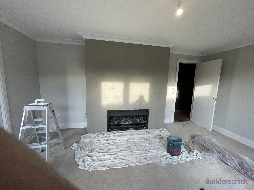 Plastering interior fireplace with sand and cement install manage to keep the original carpet and mint condition