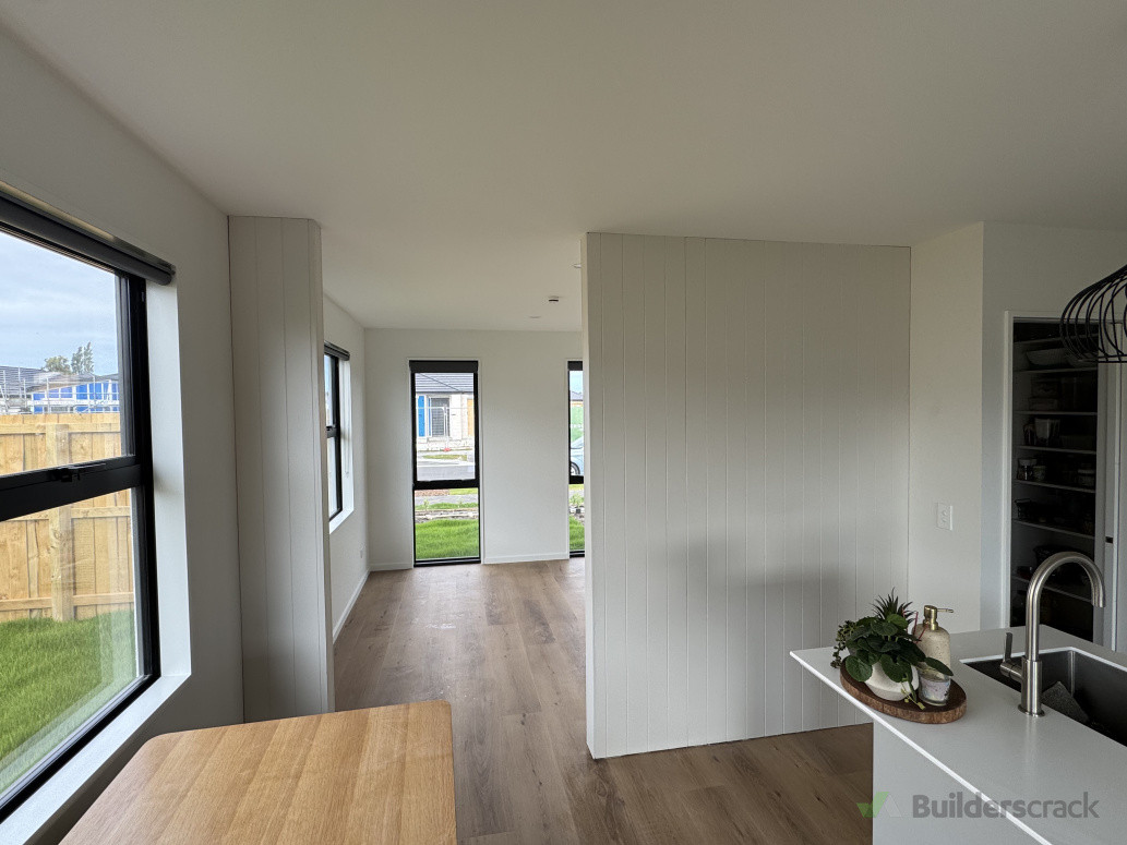Newly constructed wall with V-grooved installed and painted