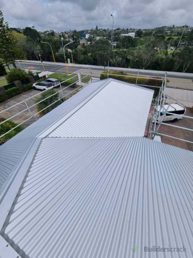 This roof we took off concrete tiles and added new purlins and replaced with corrugated iron (zincalume)