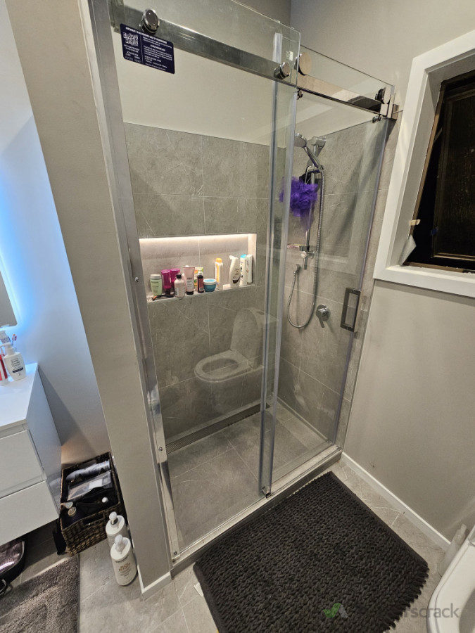 Custom sized shower due to limits set by the window. We have the solution for every problem