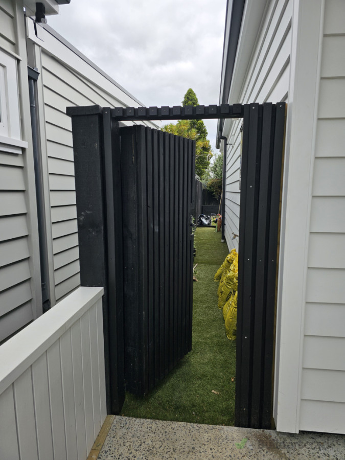 Custom gate done down the side of this property is a great touch