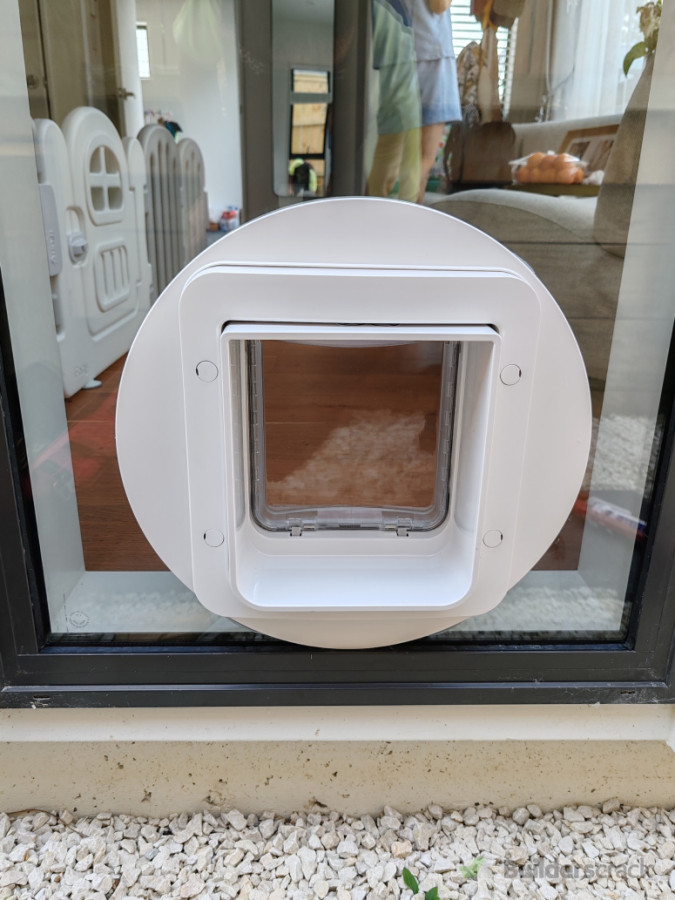 Microchip Catdoor installed on double glazed glass.