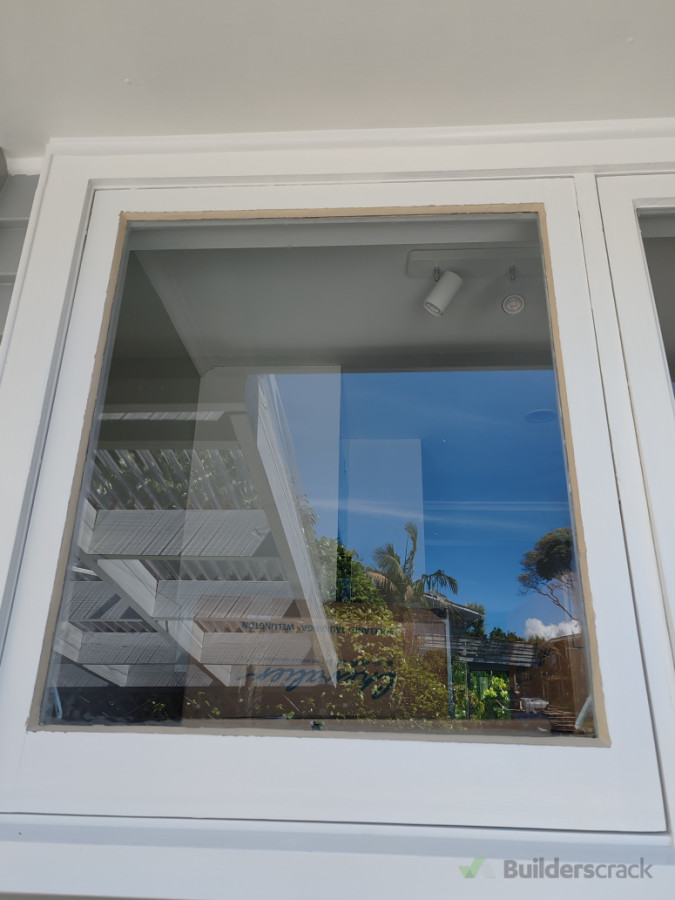 Replace broken glass on timber window.