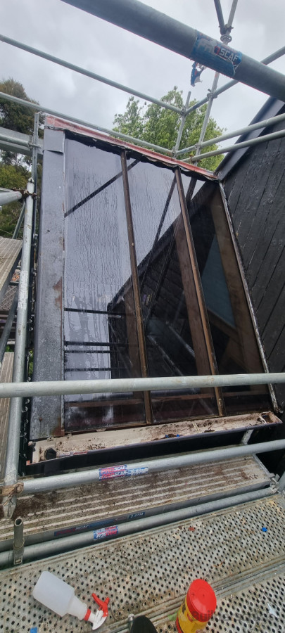 Insurance work, fixing leaking skylights