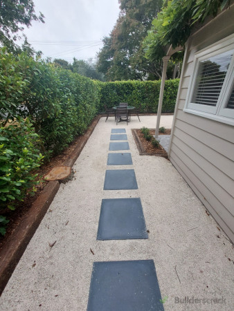 Side paver access and hoggin surface finish and railway sleepers edging