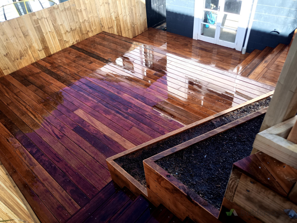 lower kwila deck level and new fences