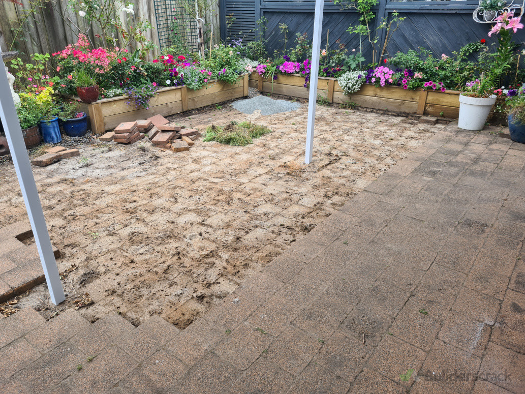Old pavers coming up in front patio