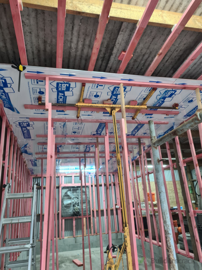 ACP linings glued to the ceiling batterns and proped