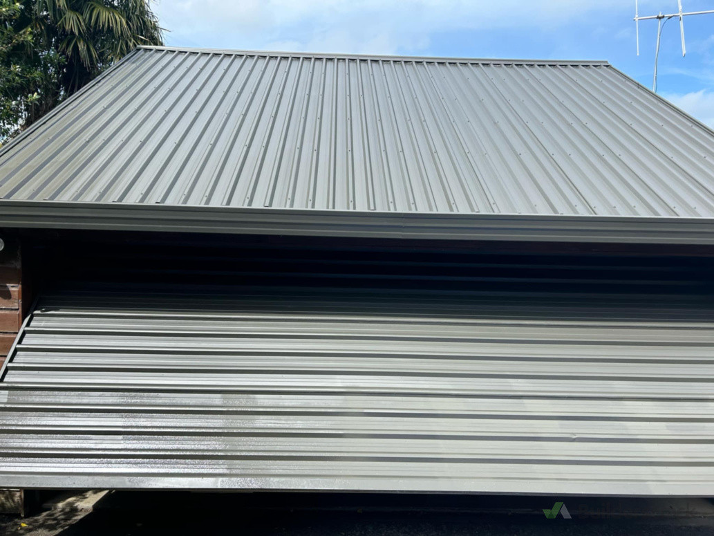 Roof and the garage door painted