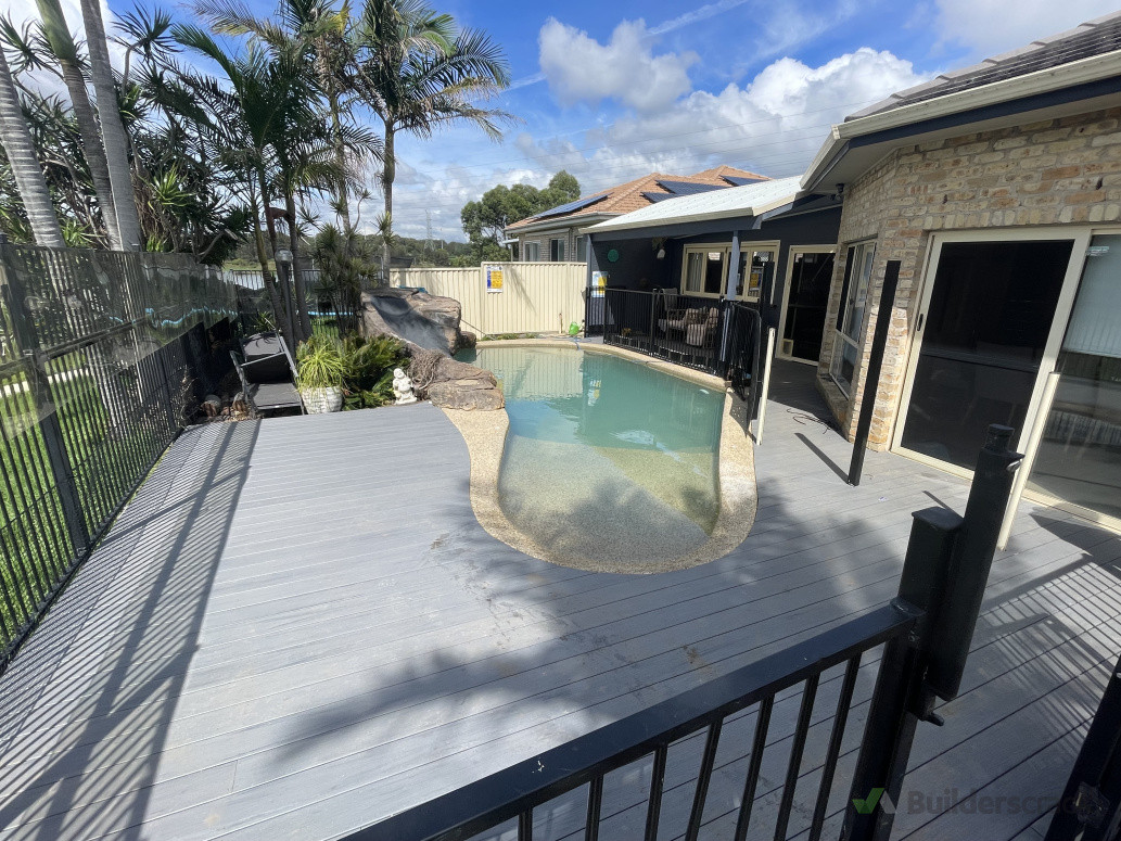 Composite decking surrounding a built in pool