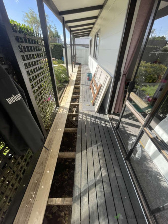 Old decking on the veranda lifted and new decking laid