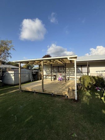Completed deck extension with new pergola