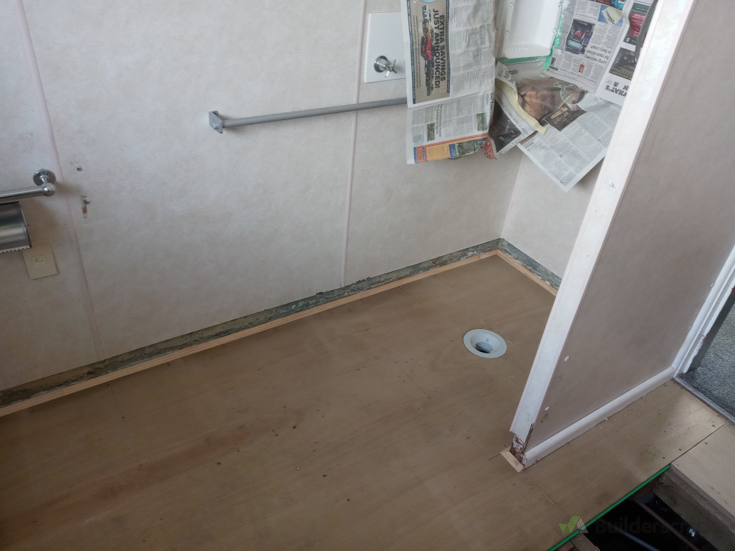 Frame and install new ply to a wet room shower