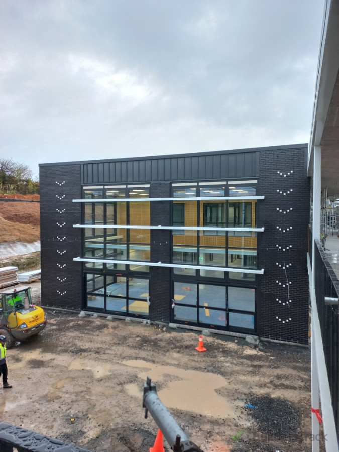 Brookfield school with designed brick wall
