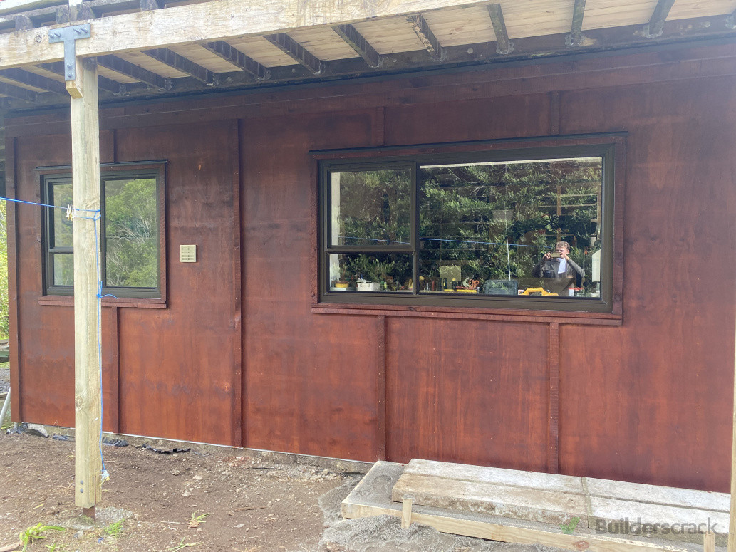 Re-clad board and batten