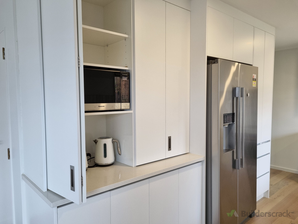 New Kitchen layout including bifold units for an asthetic look.