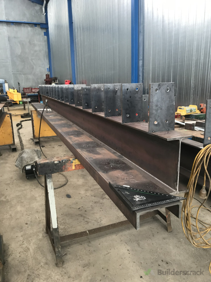 Structural beams & cleat brackets for workshop roof.