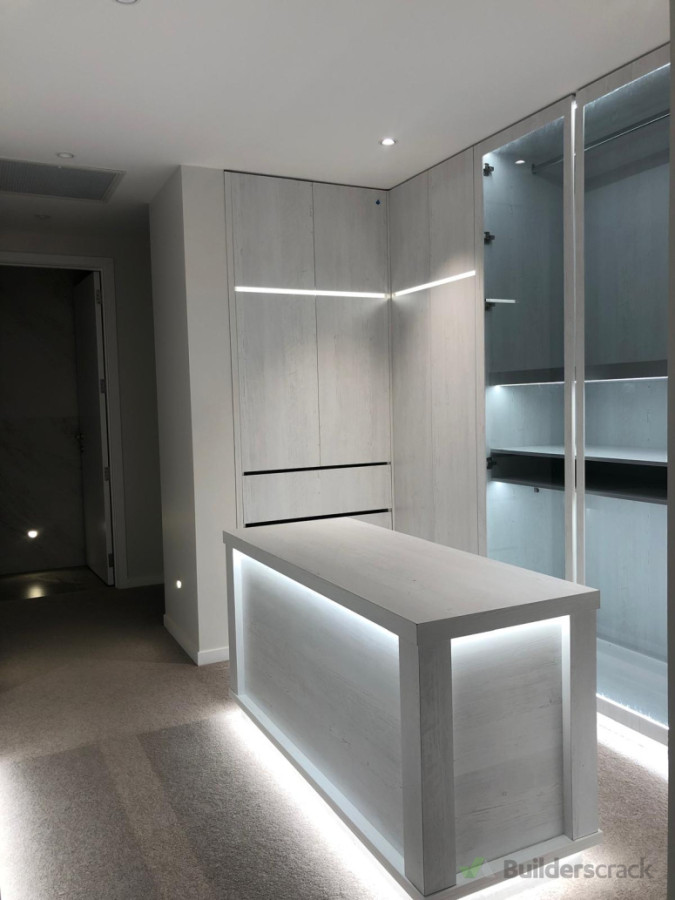 Walk through wardrobe with showcase LED strips.